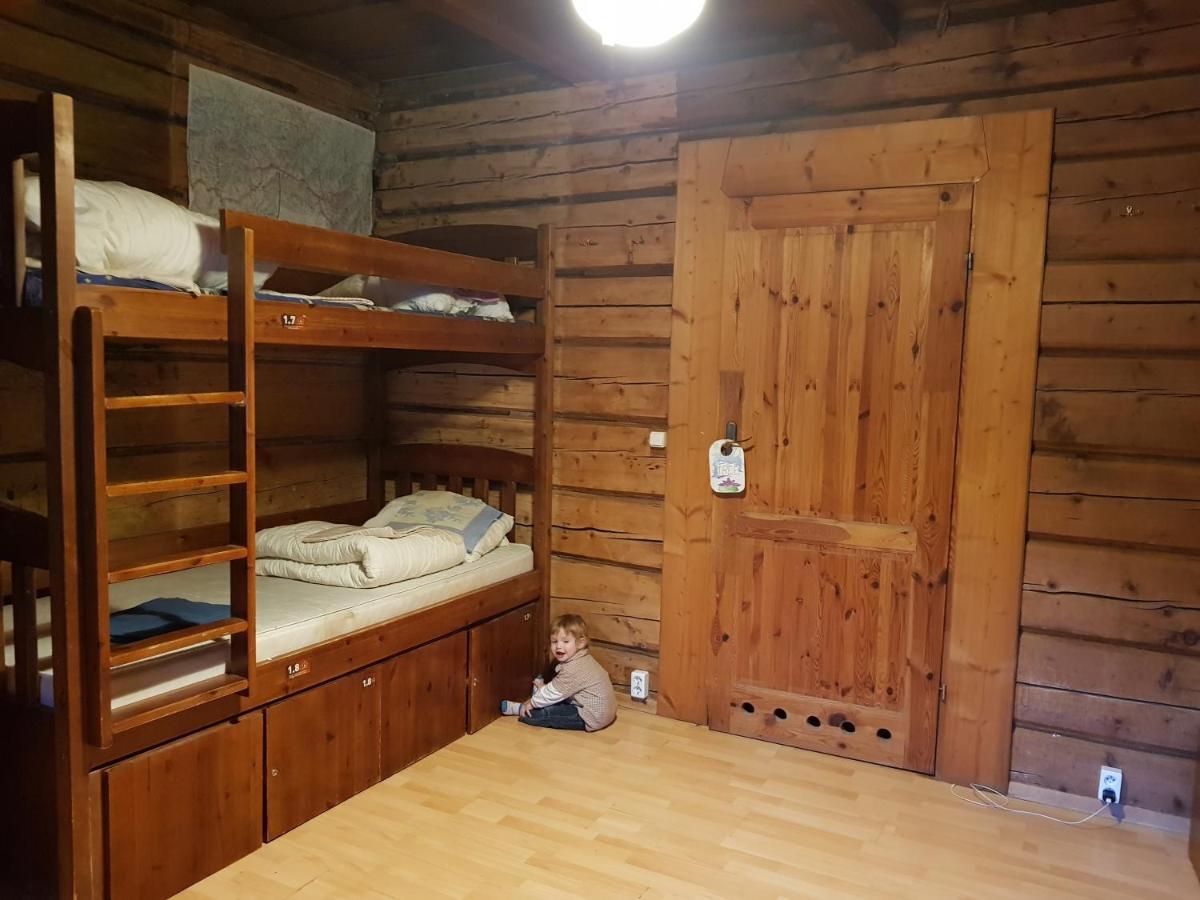 Bett in einem Schlafzimmer für 8 Personen